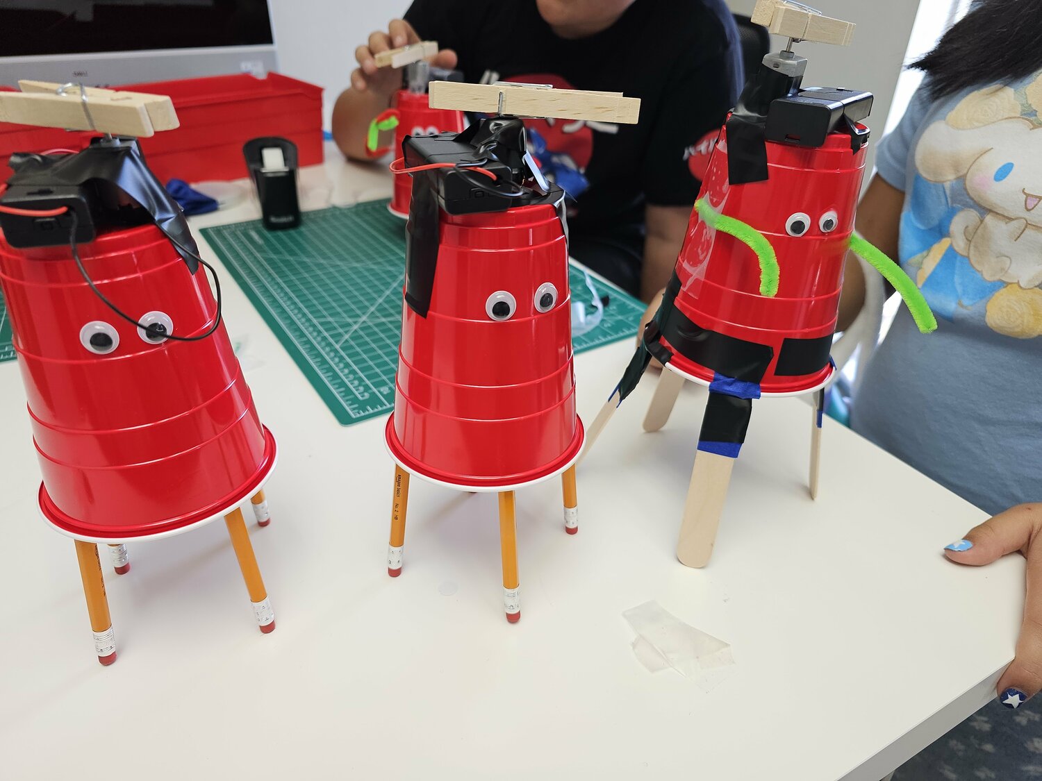 Robot building at summer camp in La Mesa Kids doing science experiment at La Mesa summer camp